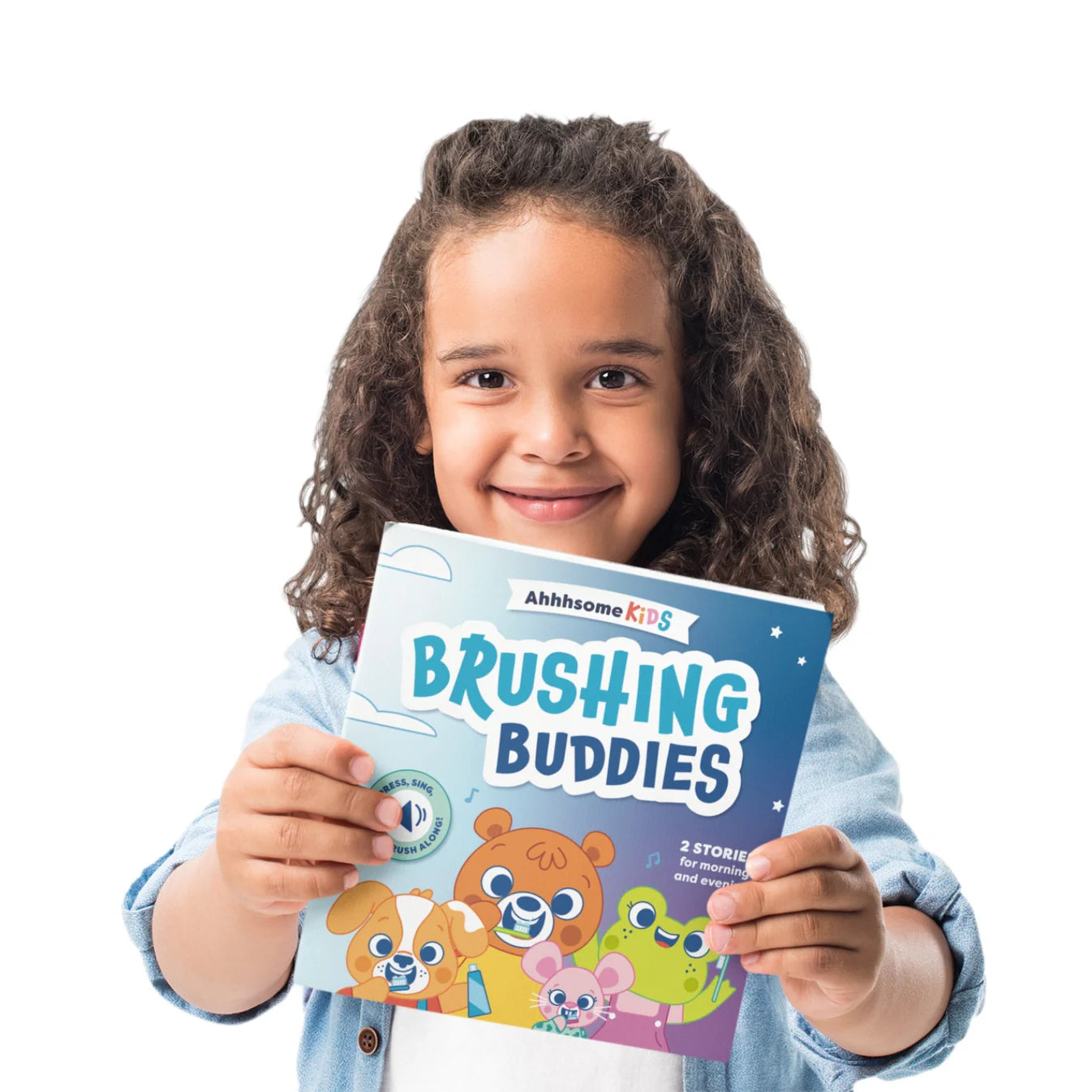 girl holding the Brushing Buddies book
